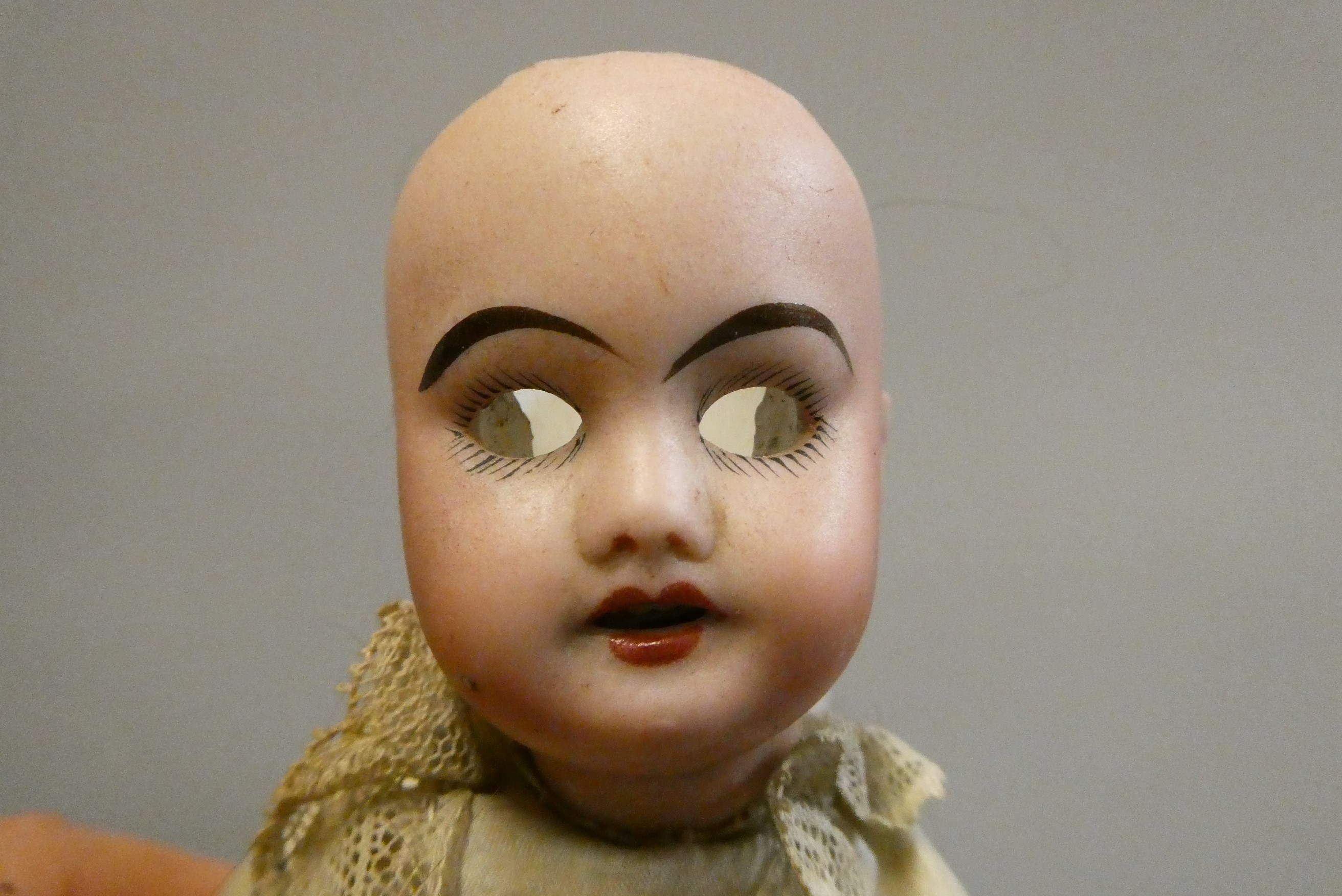 Two miniature bisque socket head dolls Image