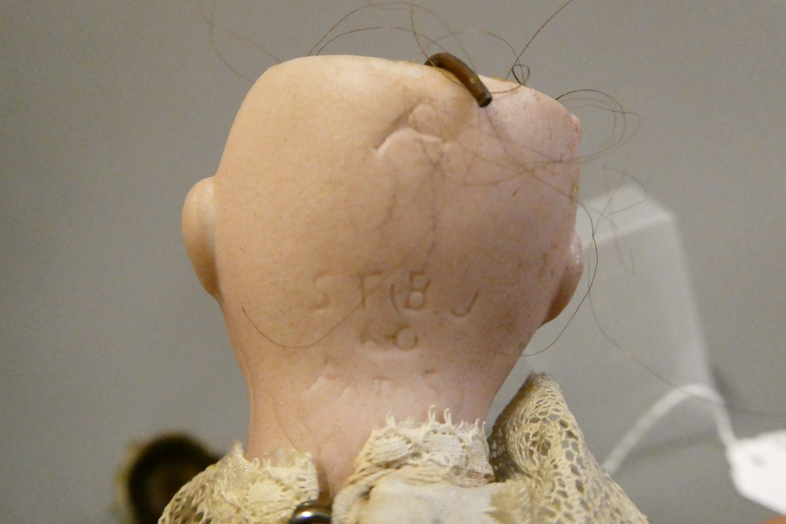 Two miniature bisque socket head dolls Image