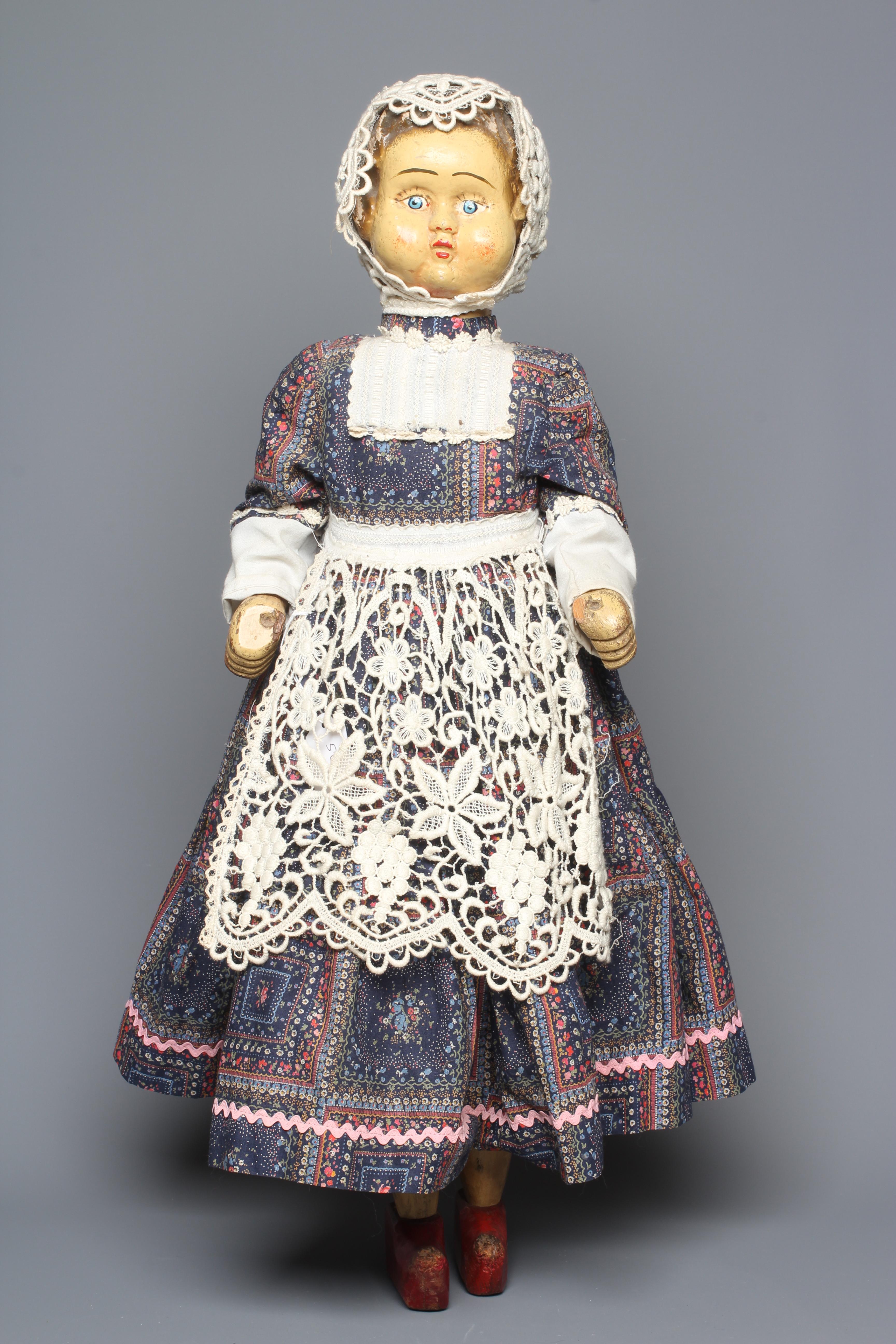 A rare folk art wooden walking doll Image
