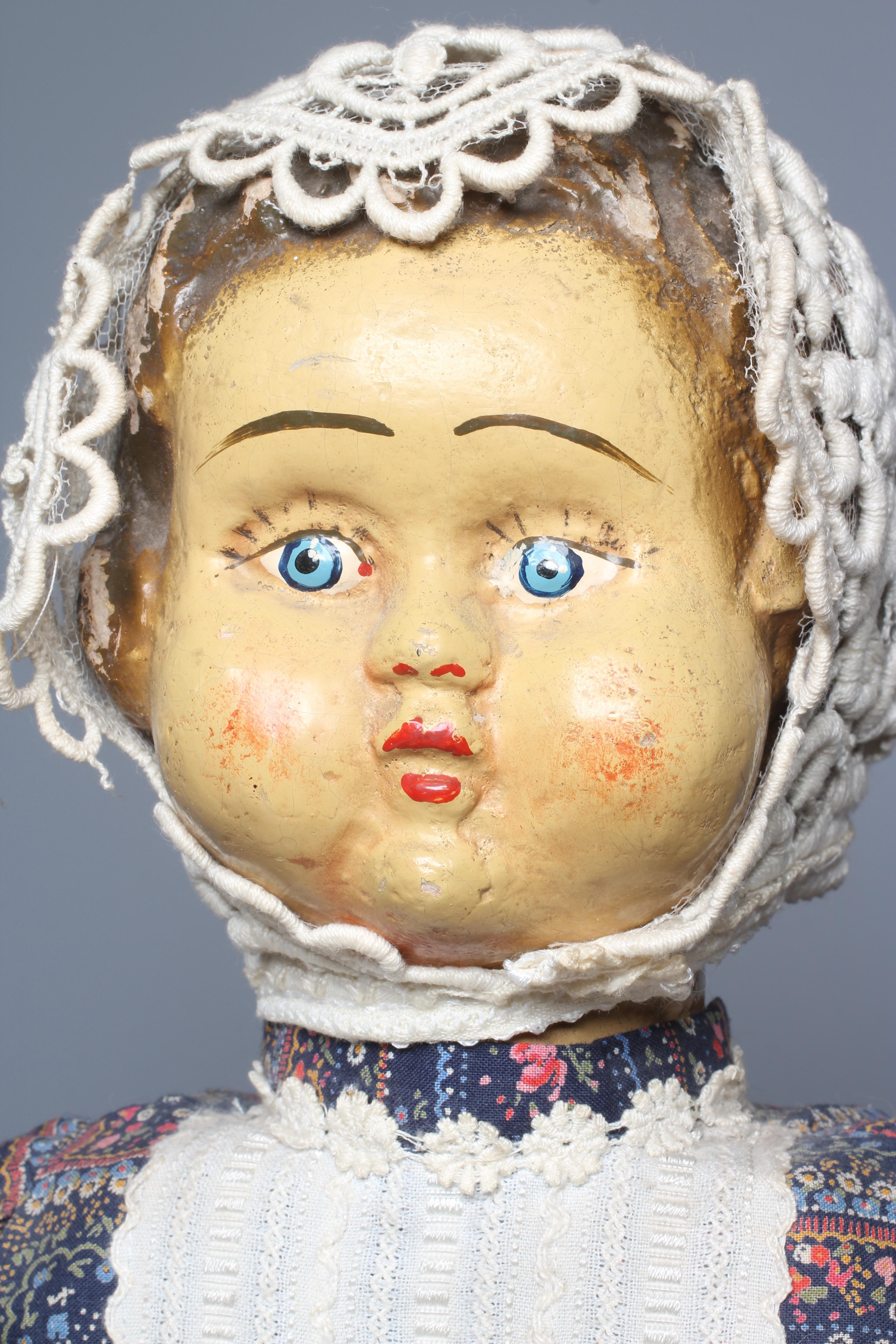 A rare folk art wooden walking doll Image