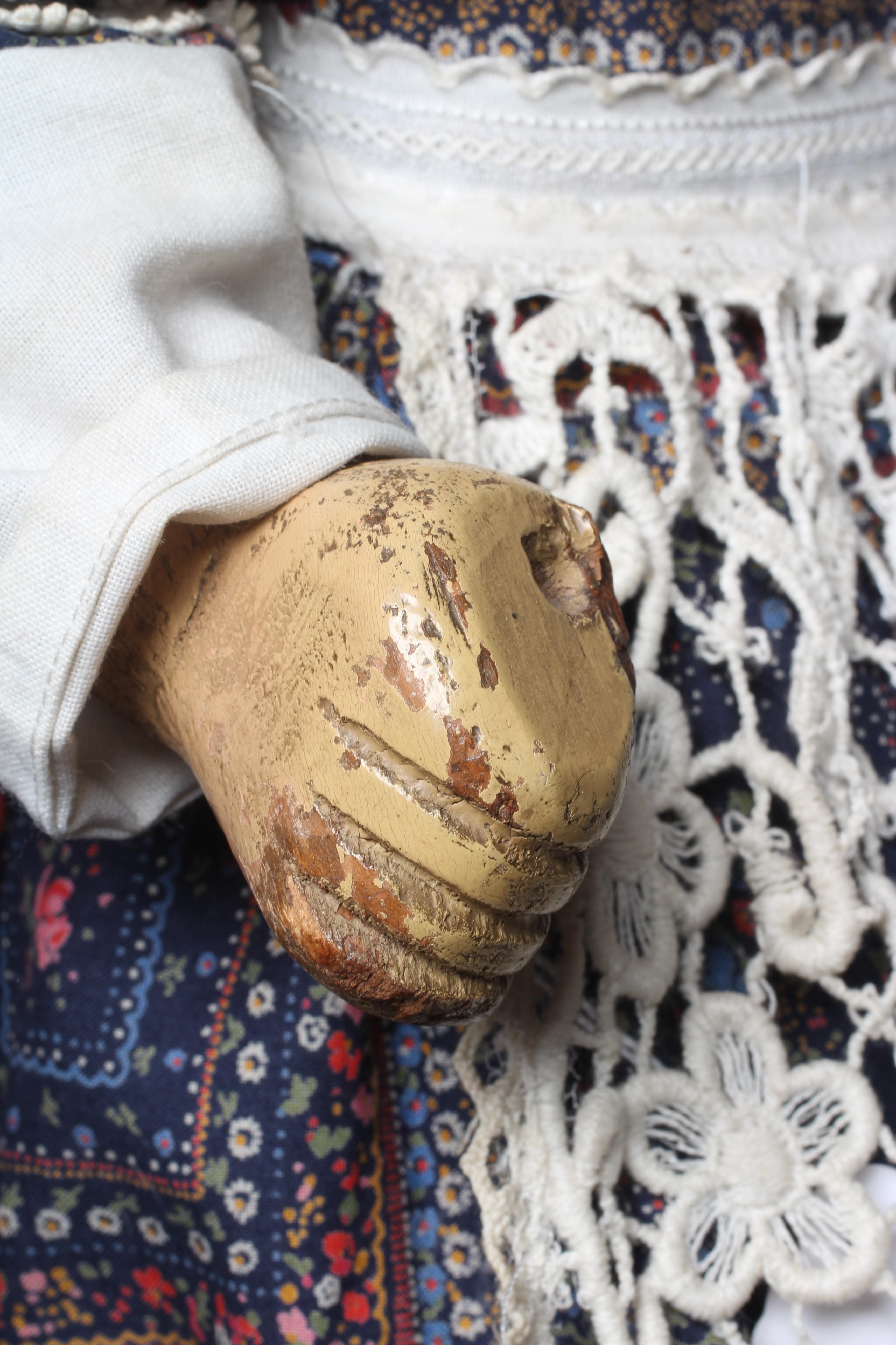 A rare folk art wooden walking doll Image
