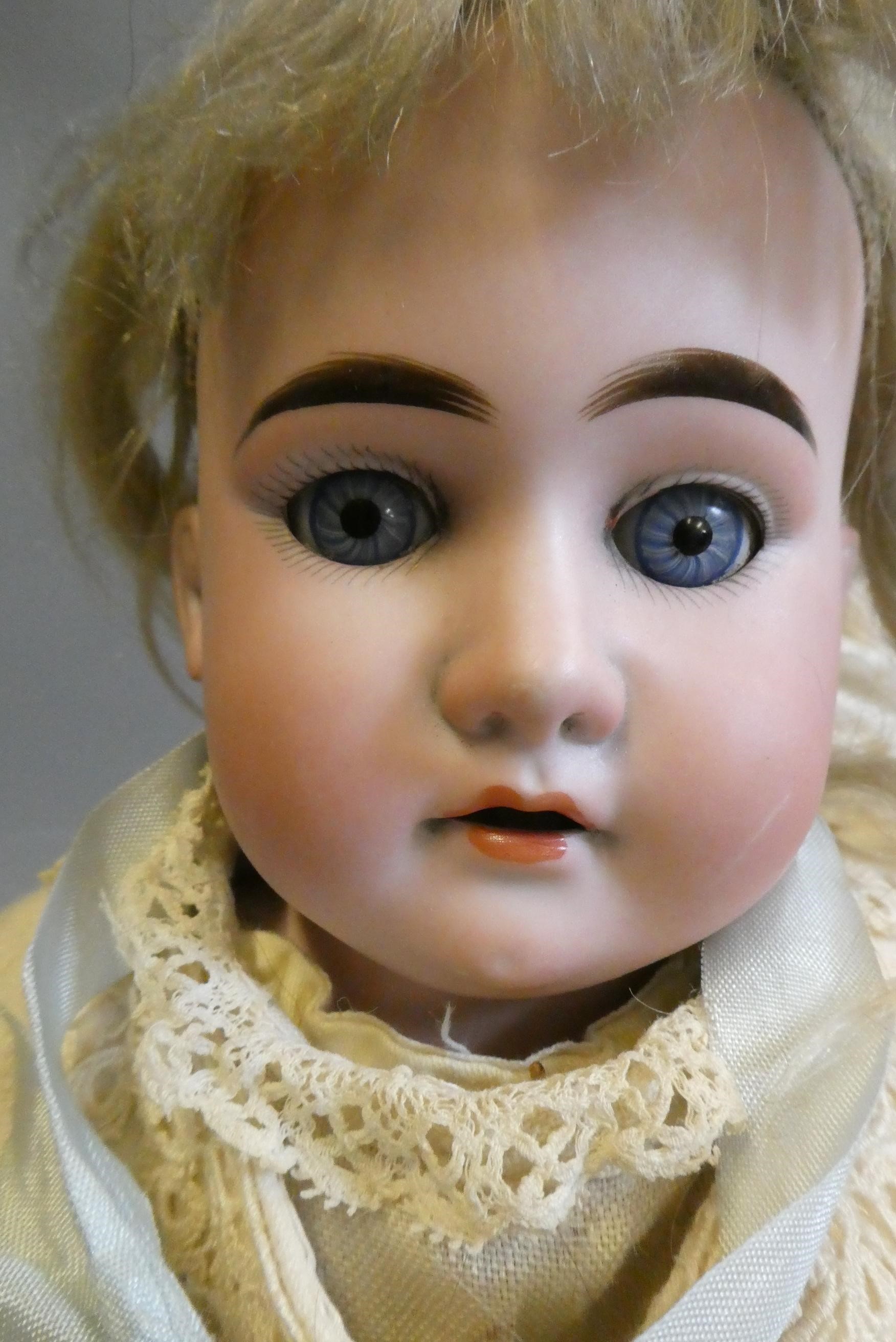 Two Armand Marseille bisque shoulder head dolls Image