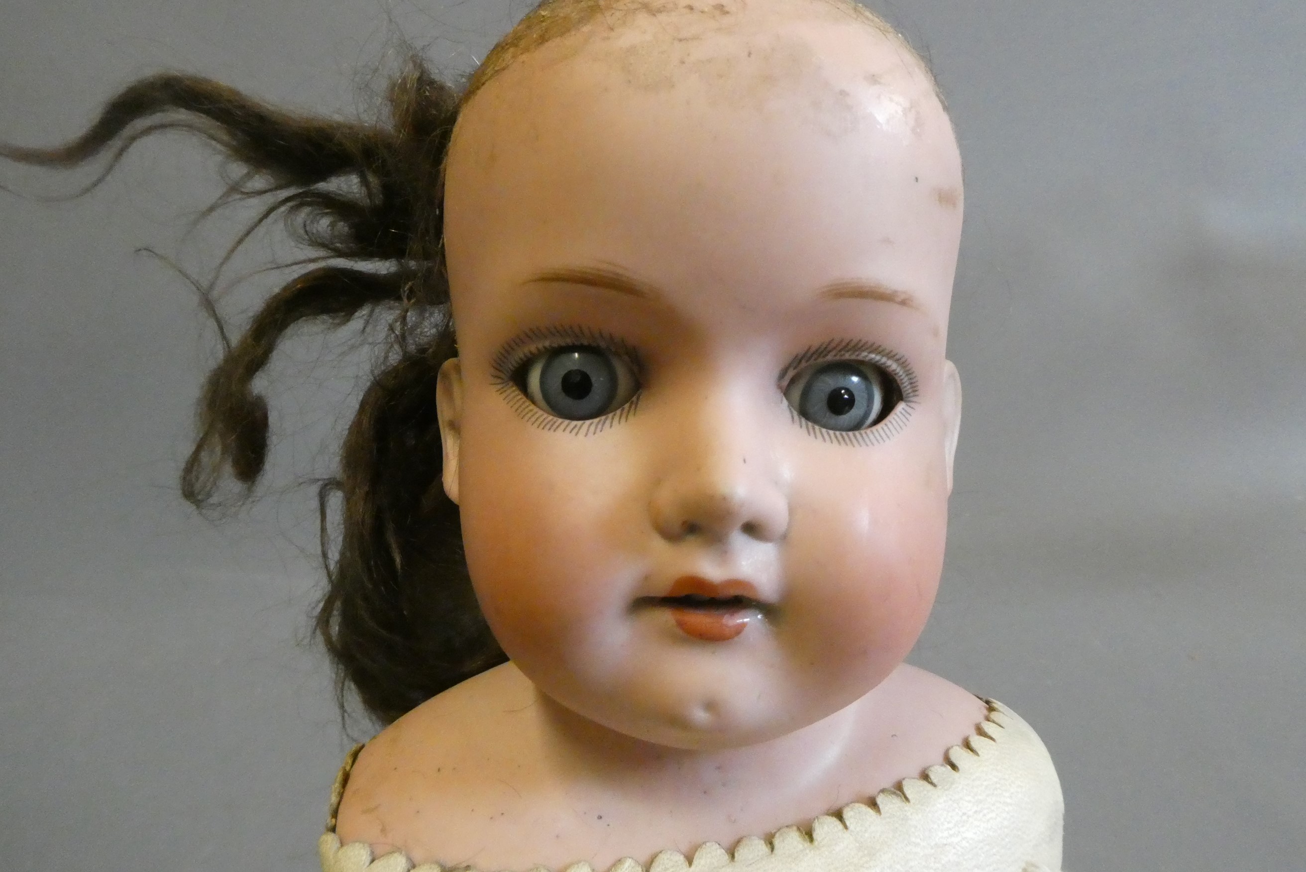 Two Armand Marseille bisque shoulder head dolls Image