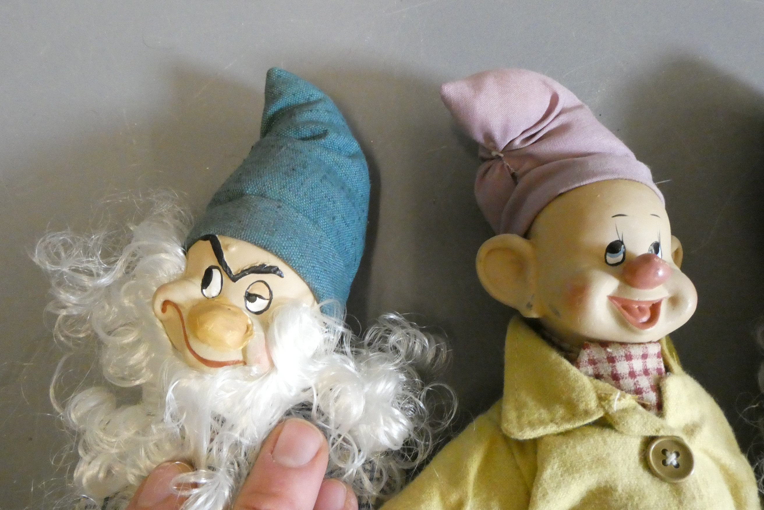 The Seven Dwarfs, from Snow White, with composite faces and hands, cloth bodies and original Image