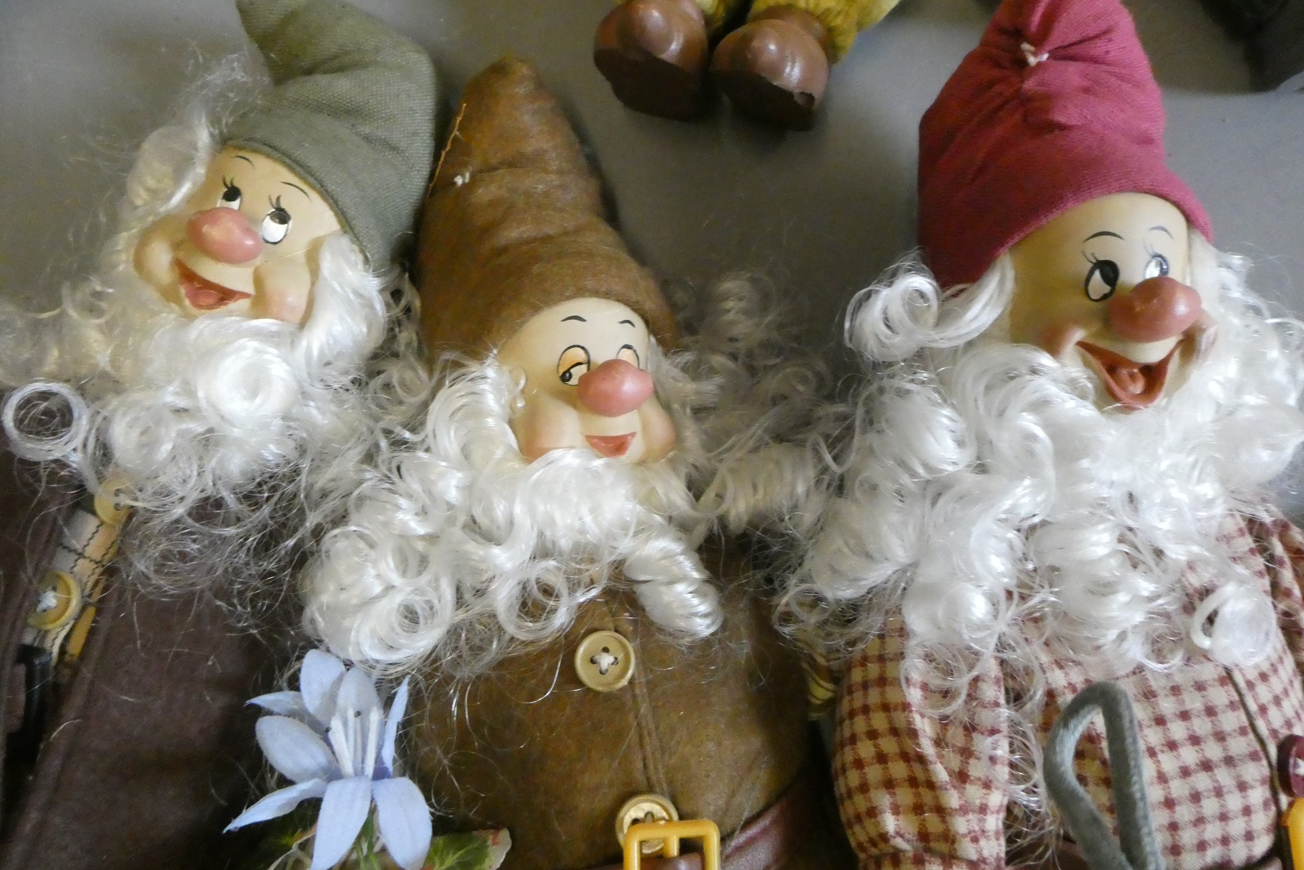 The Seven Dwarfs, from Snow White, with composite faces and hands, cloth bodies and original Image