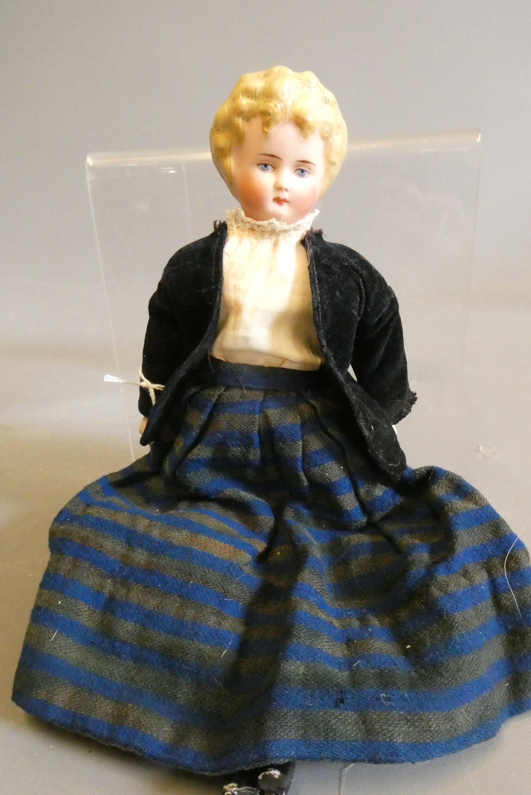 A bisque shoulder head doll, possible Alt, Beck & Gottschalck, with moulded hair, painted features, Image