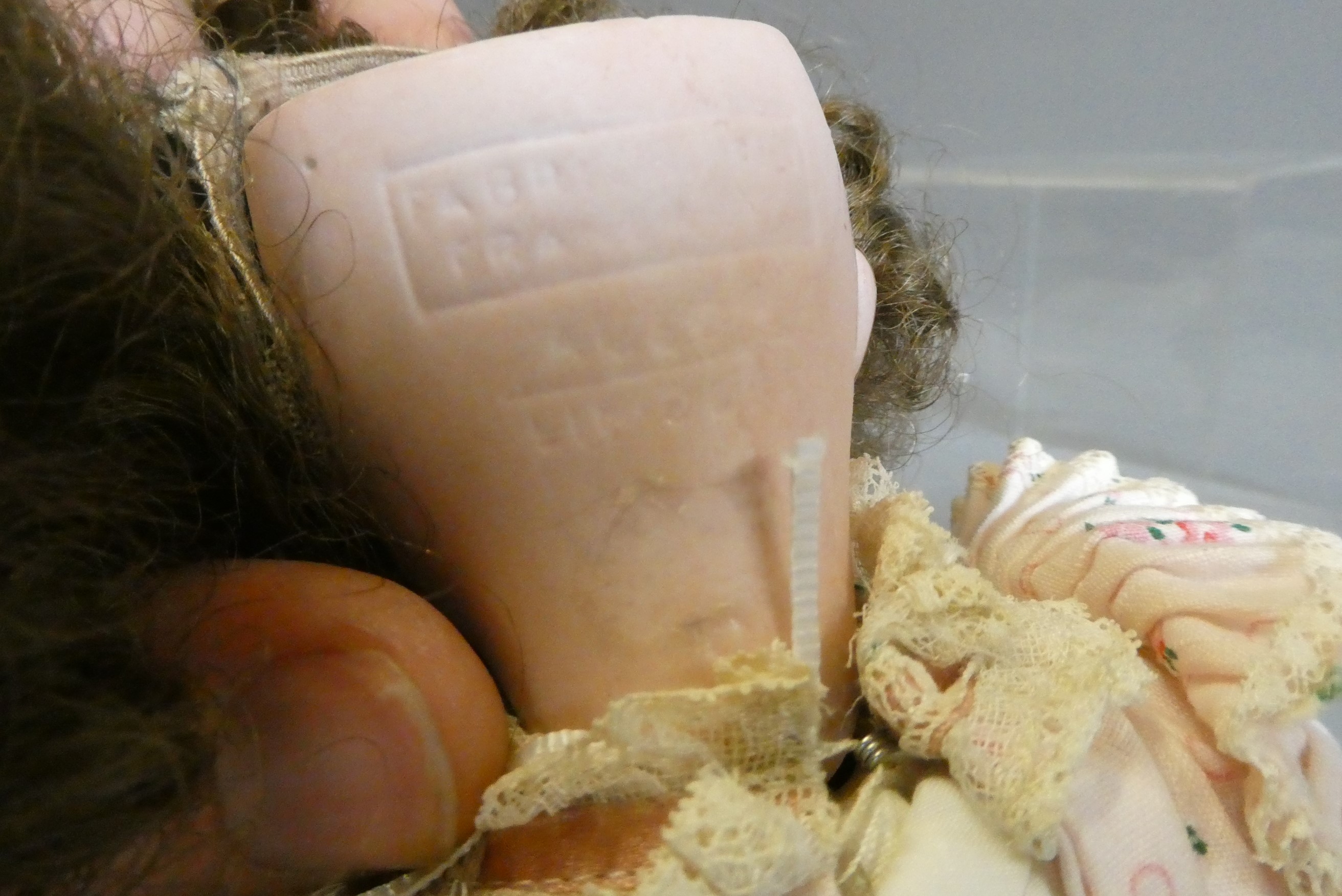 Three small bisque socket head dolls Image