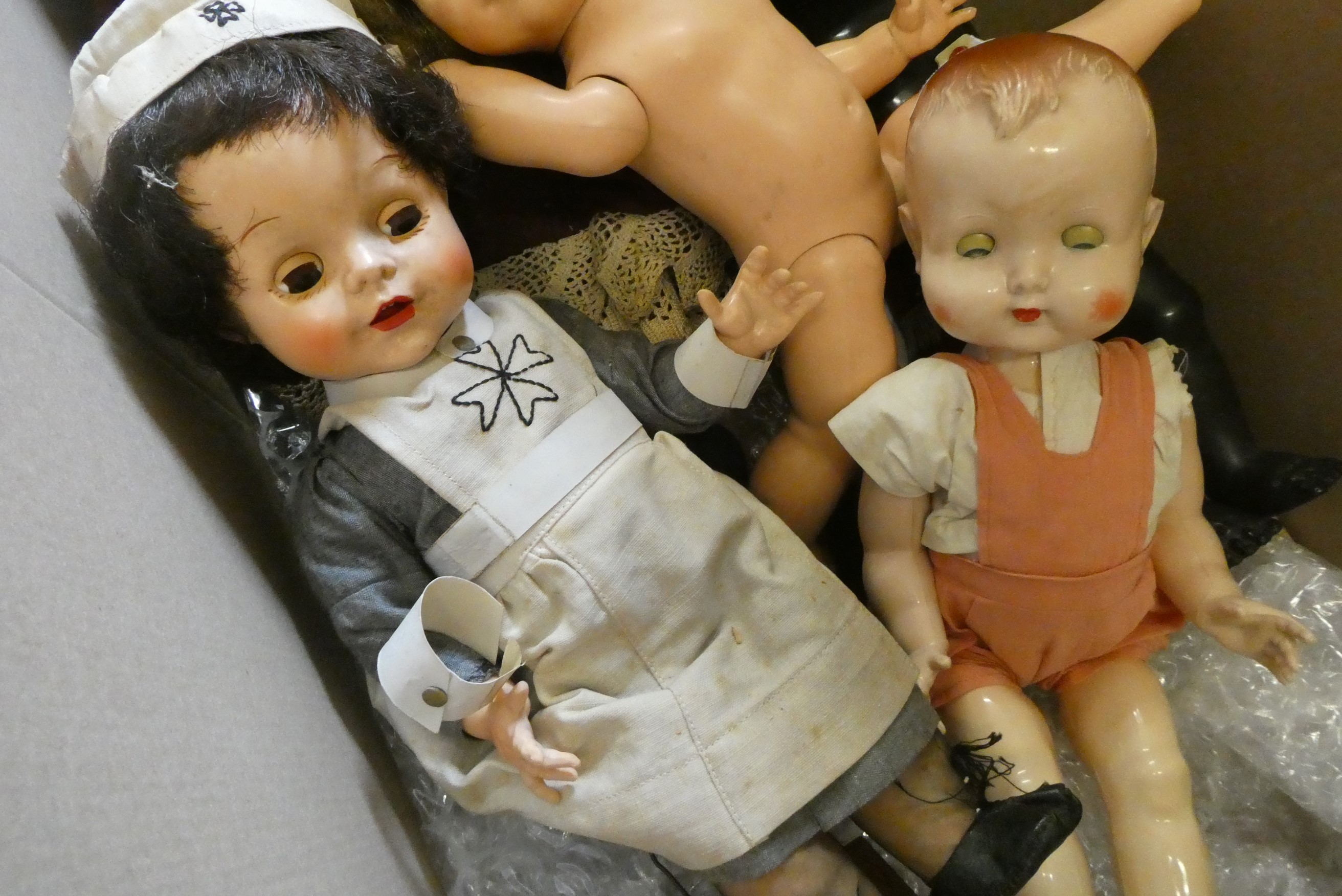 Six vintage celluloid dolls, including Pedigree and others, largest 22" tall Image