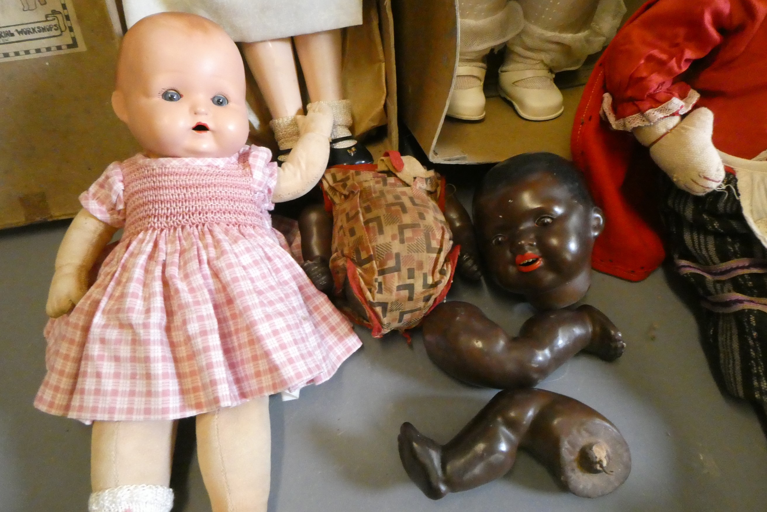 Five vintage dolls, including two in original boxes (one by Lord Roberts Memorial Workshops), an AM Image