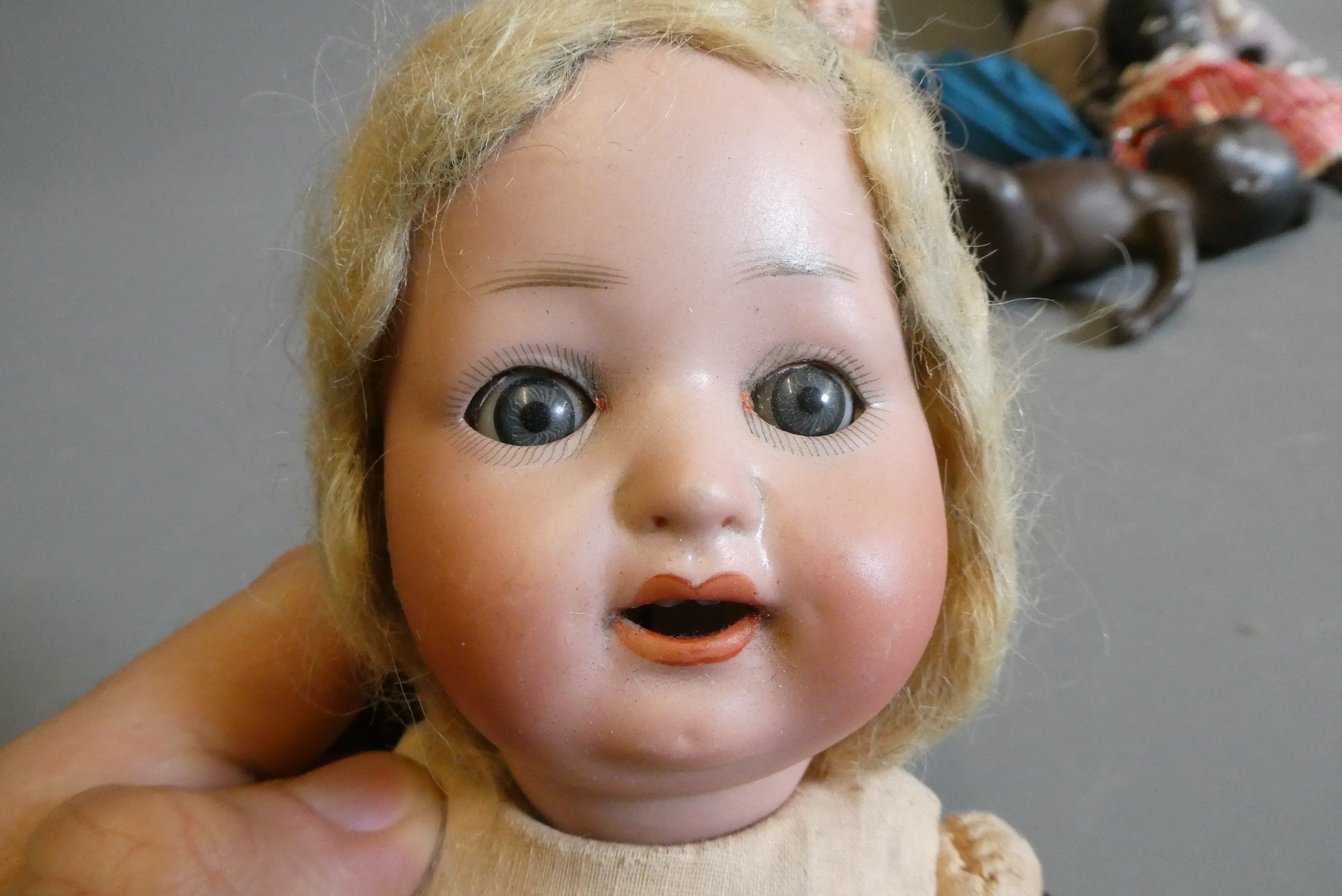 Eight vintage and early 20th century dolls, including an AM 351 baby, a Heubach Koppelsdorf 300, Image