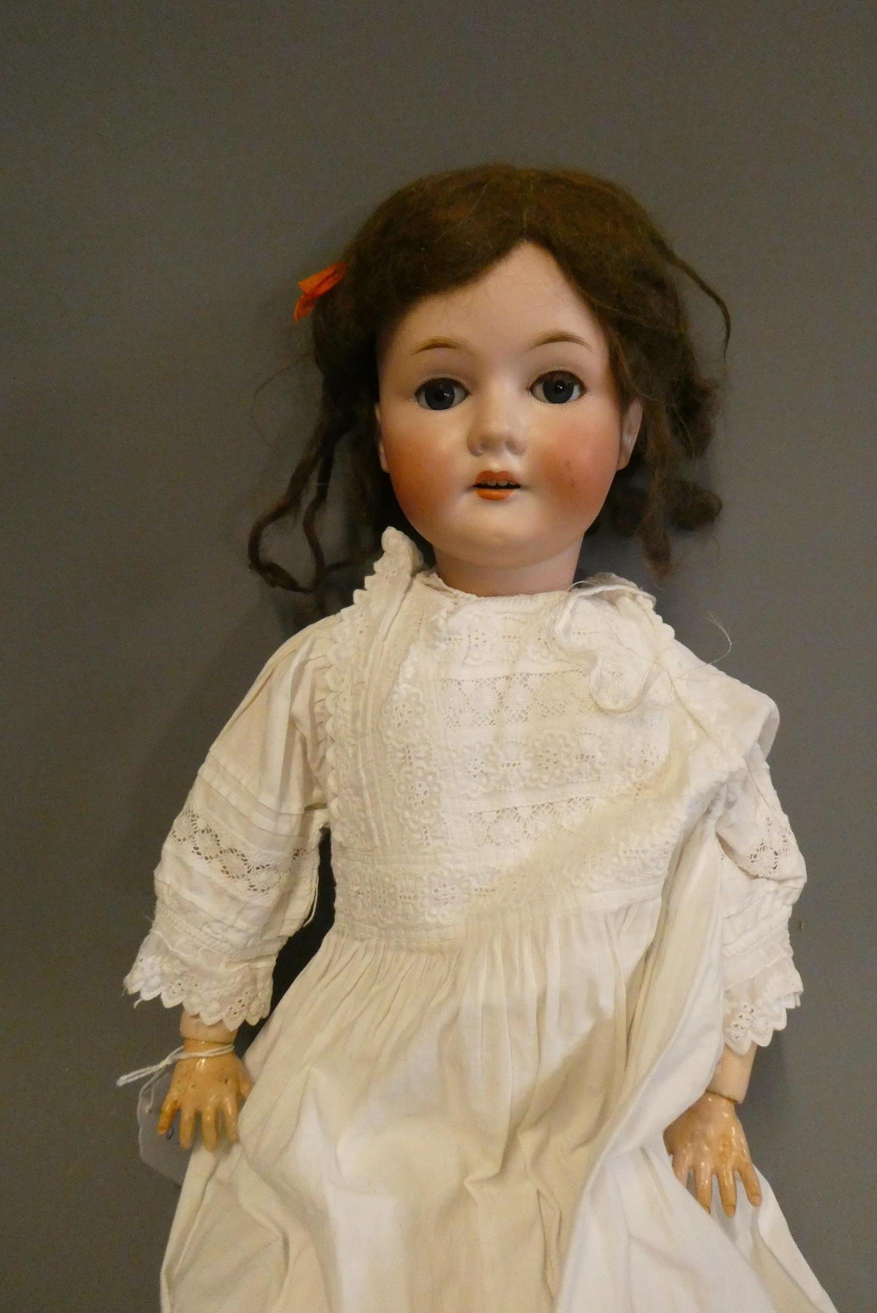 A Bergmann Walterhausen bisque socket head doll, with blue glass sleeping eyes, open mouth, teeth, Image