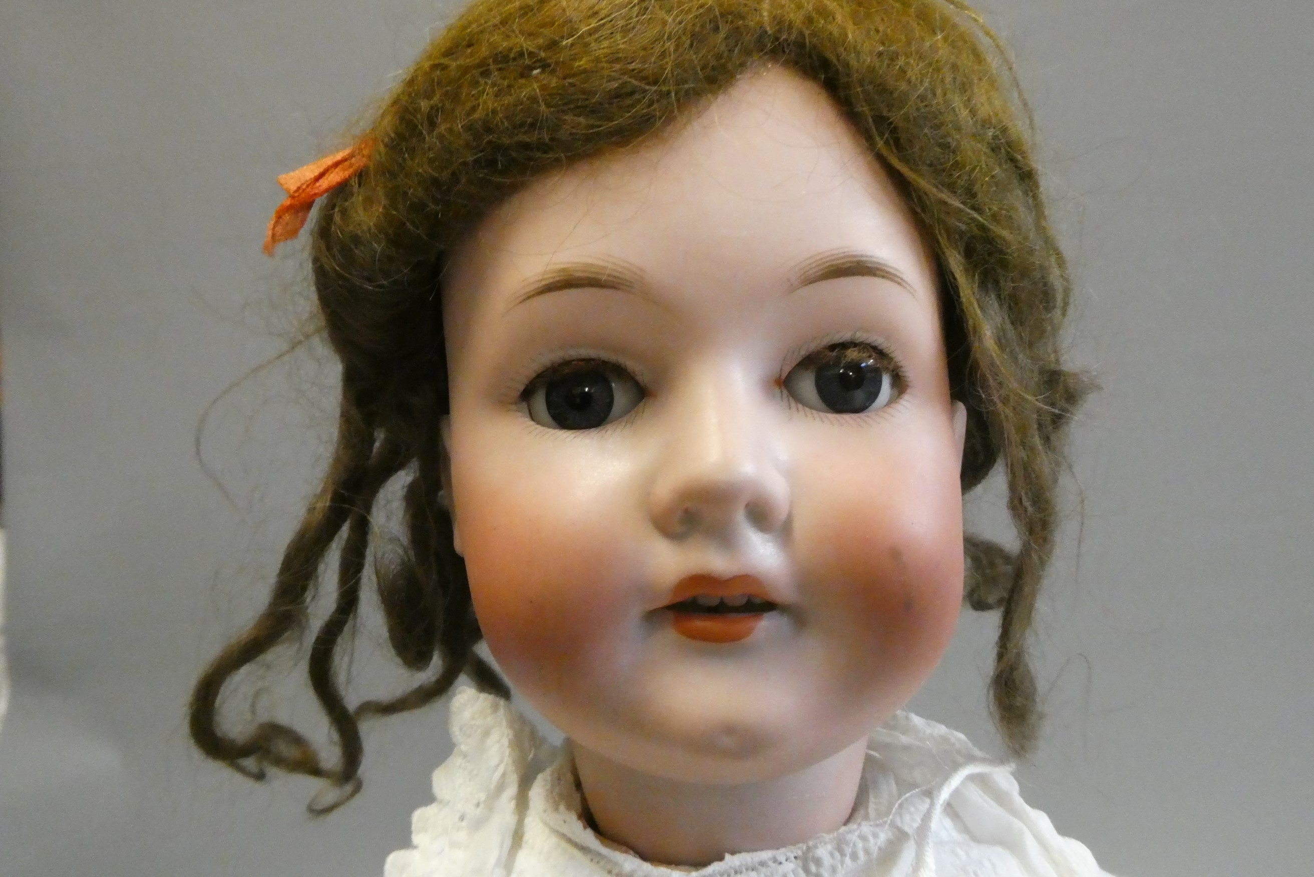 A Bergmann Walterhausen bisque socket head doll, with blue glass sleeping eyes, open mouth, teeth, Image