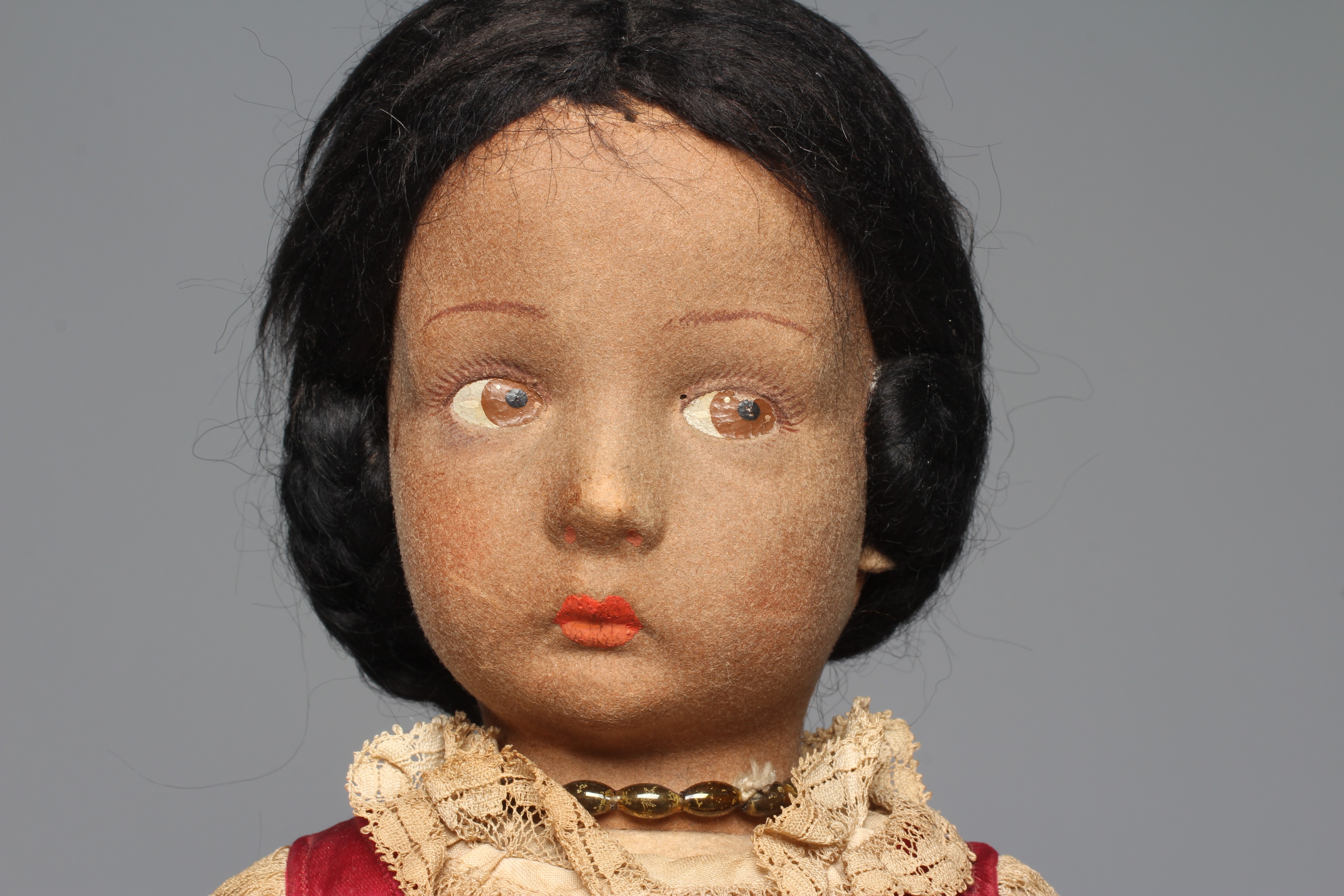 A pre-war Lenci girl doll, with sideways glancing eyes, felt body, bent arms, straight legs and Image