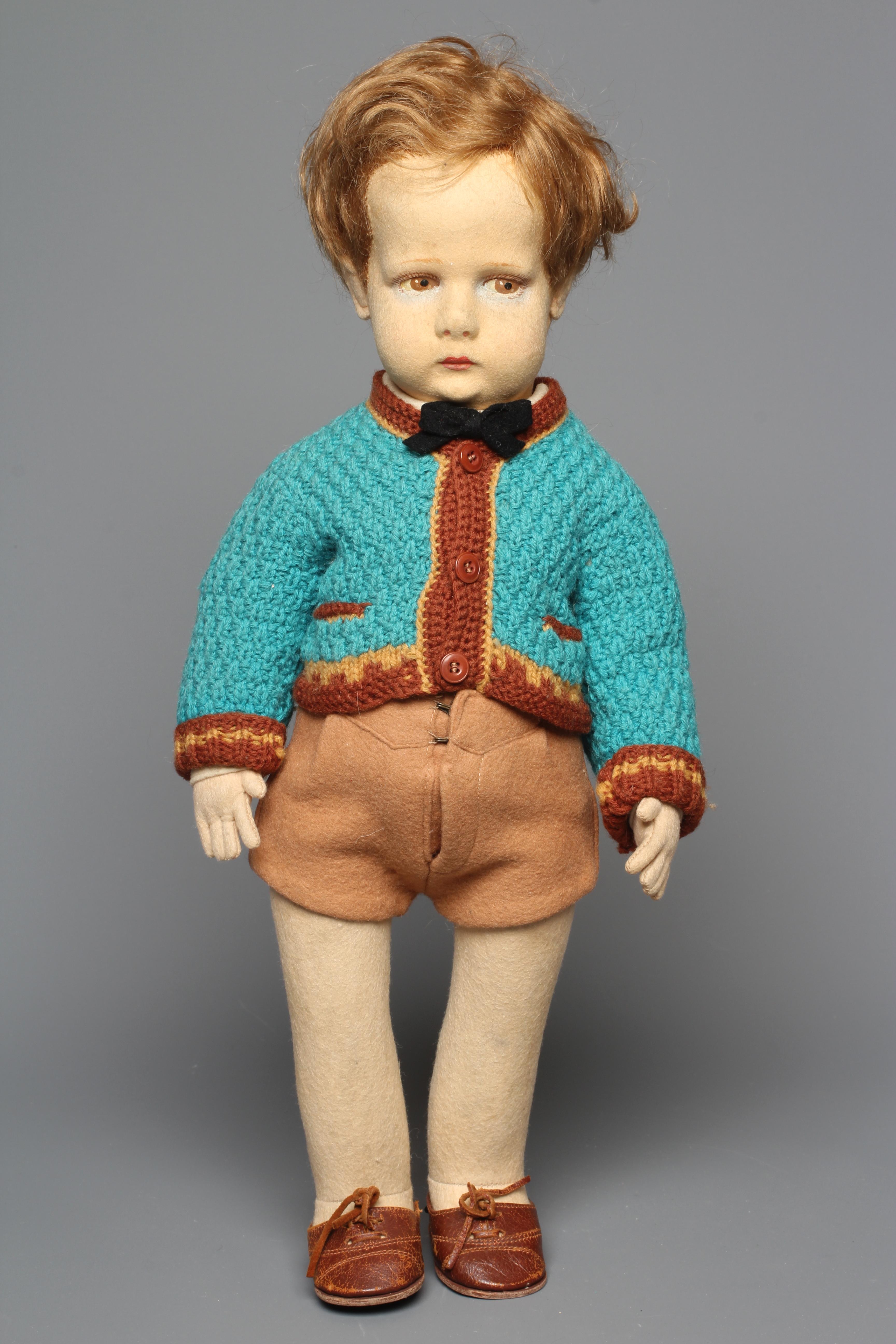 An early Lenci boy doll, with sideways glancing eyes, felt body, original outfit, leather shoes, 16 Image