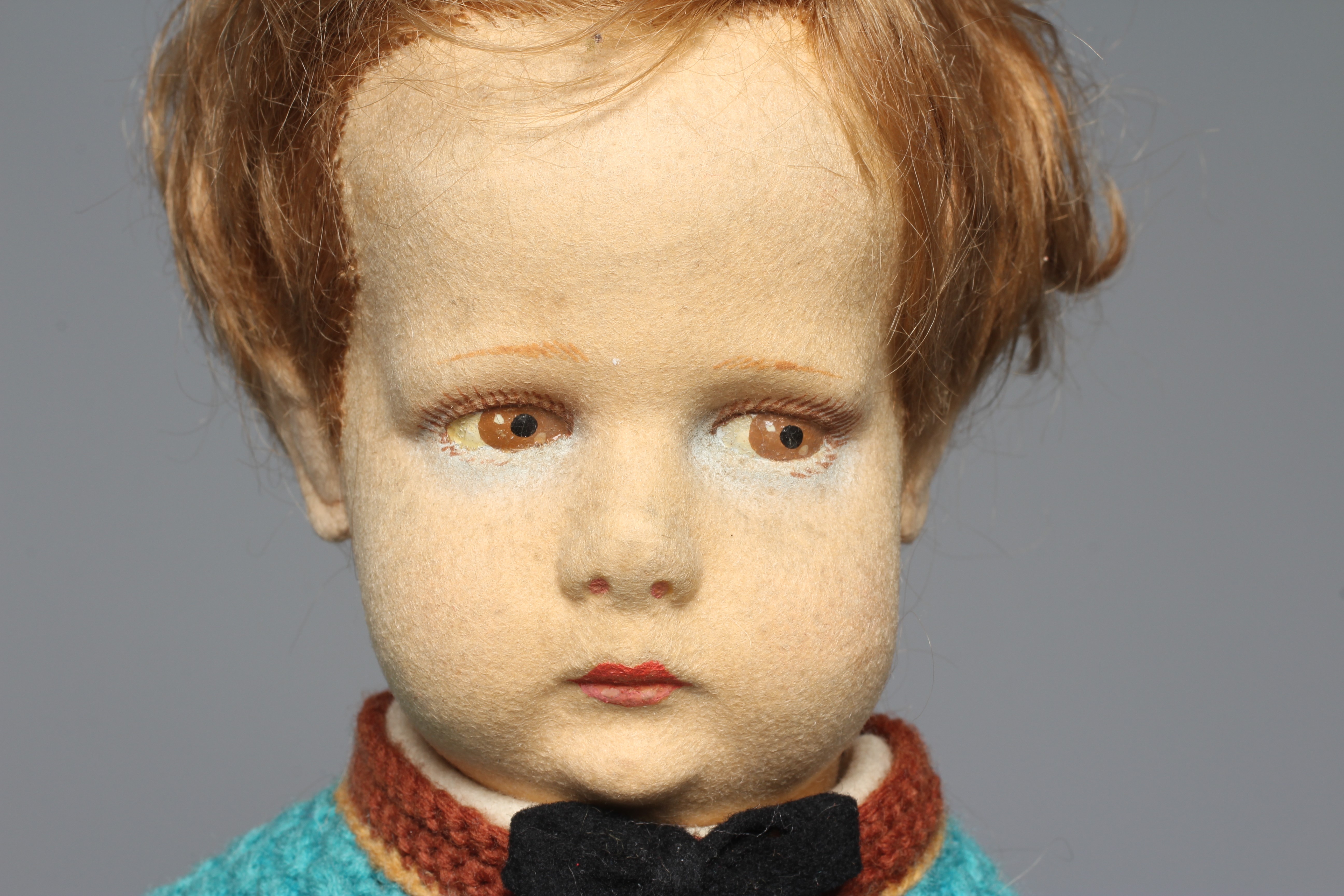 An early Lenci boy doll, with sideways glancing eyes, felt body, original outfit, leather shoes, 16 Image