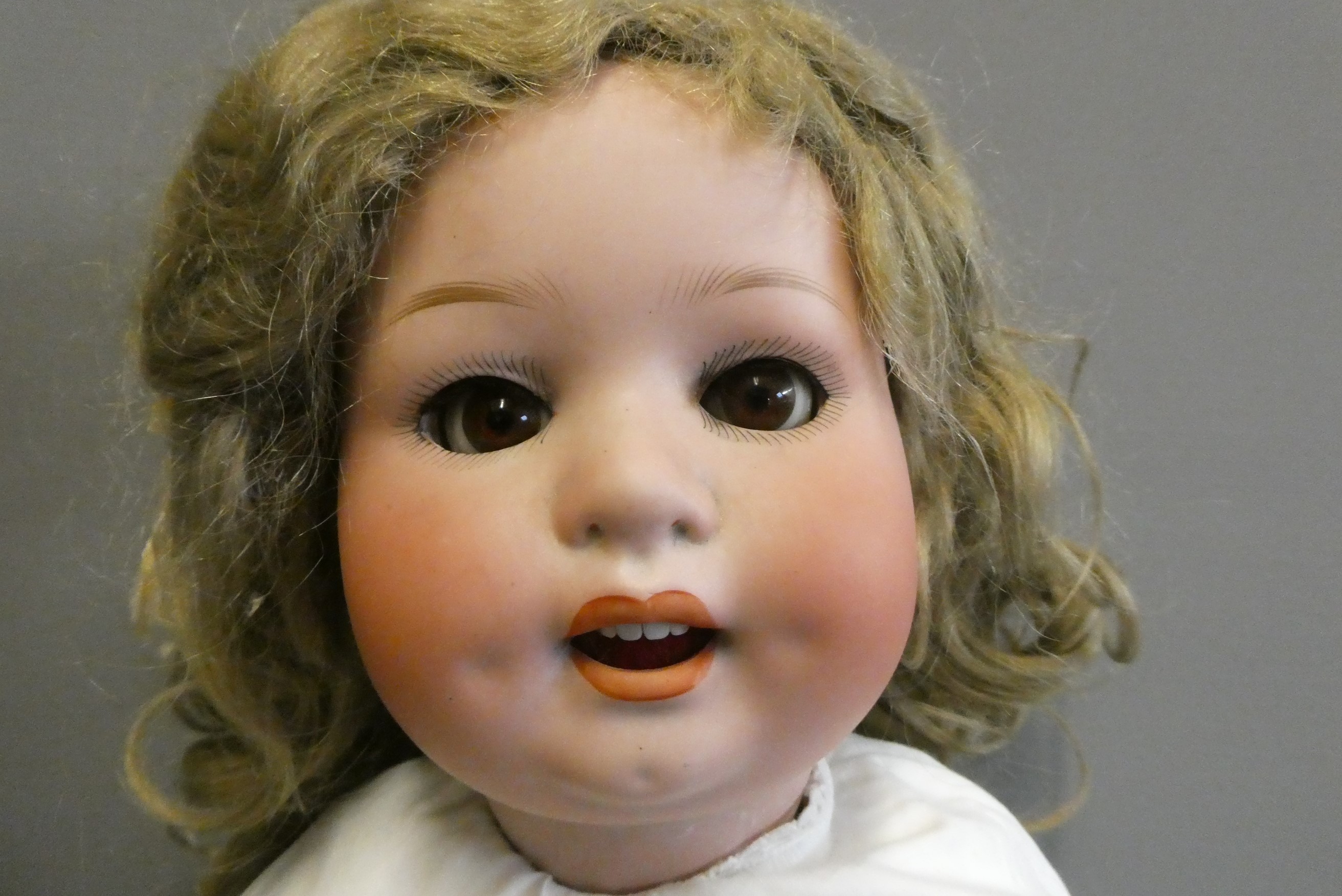 A Heubach Koppelsdorf bisque socket head character doll Image