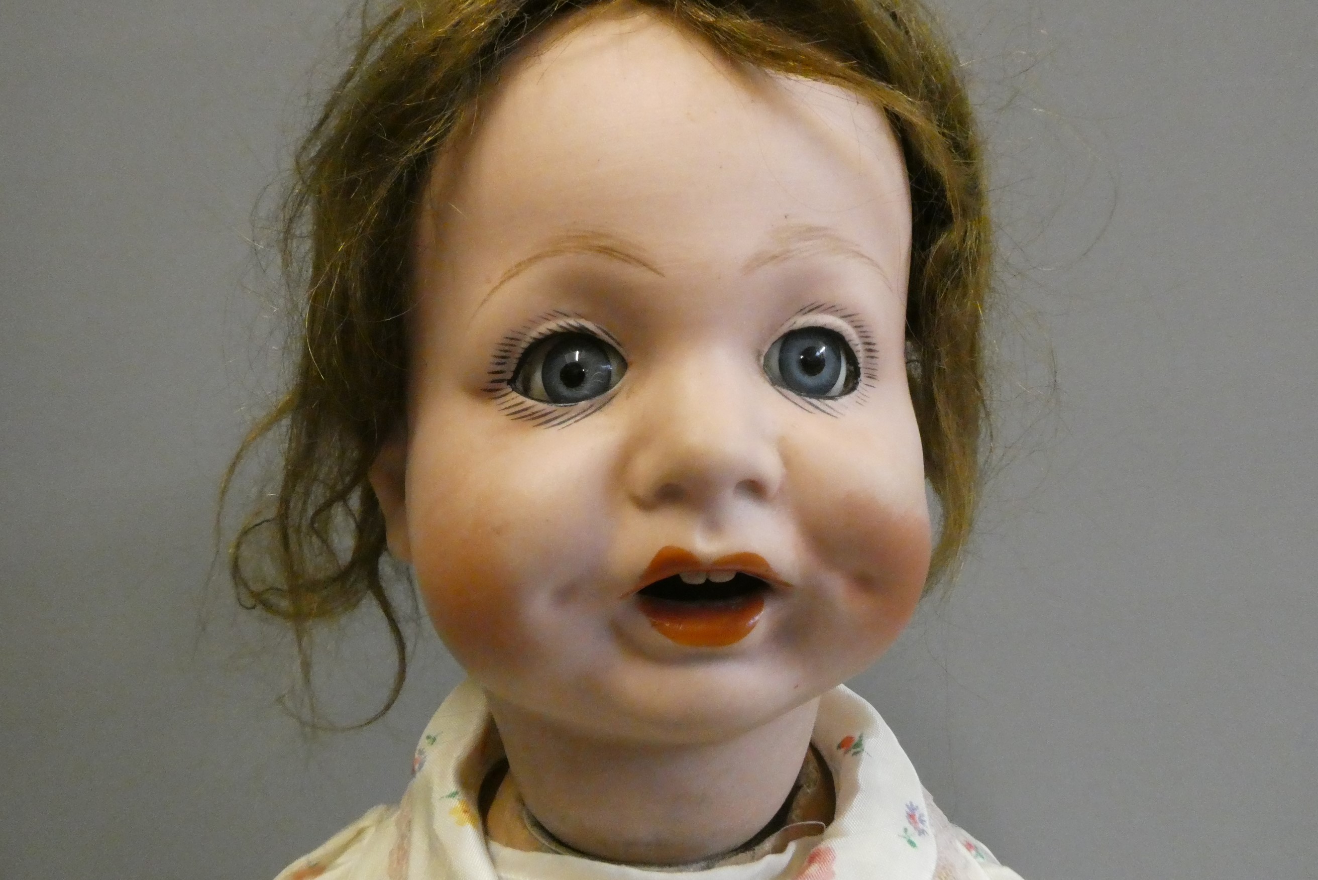 A "Nunsuch" Nunn & Smeed bisque British socket head doll, circa 1920, with blue glass fixed eyes, Image