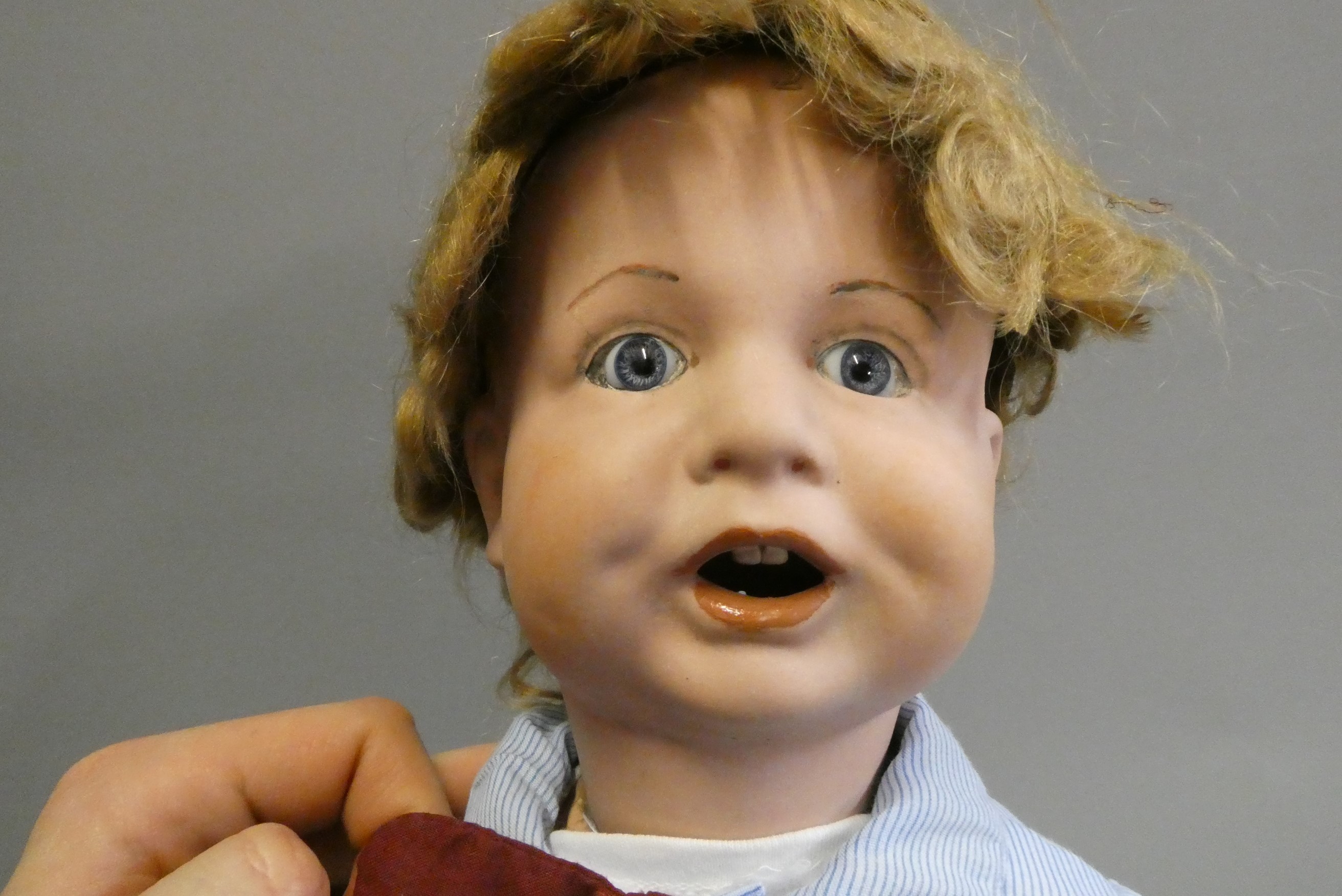A "Nunsuch" Nunn & Smeed bisque British socket head doll, circa 1920, with blue glass fixed eyes, Image