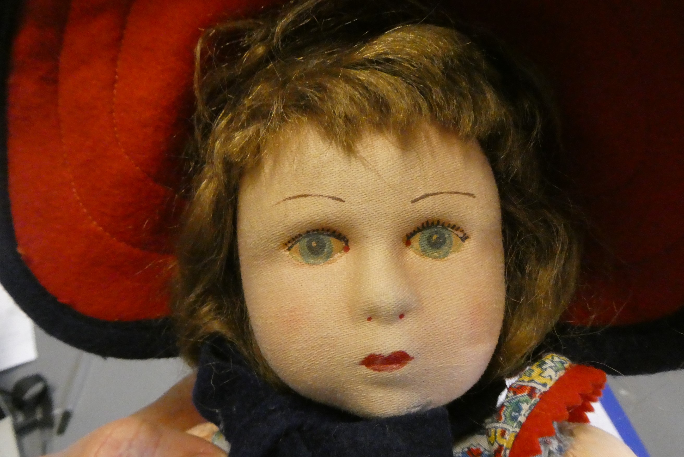 A Lenci girl doll, with fabric construction, painted features, original dress, felt shoes and hat, Image