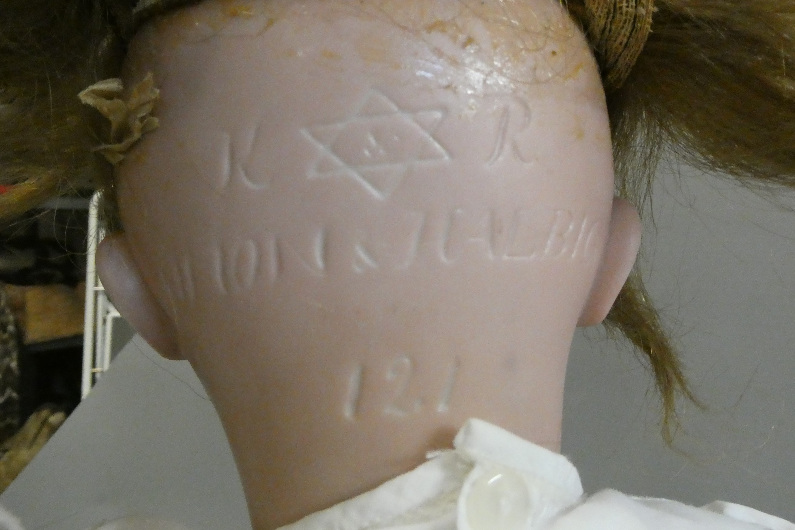 A Simon & Halbig K & R bisque socket head doll, with brown glass sleeping eyes, open mouth, applied Image