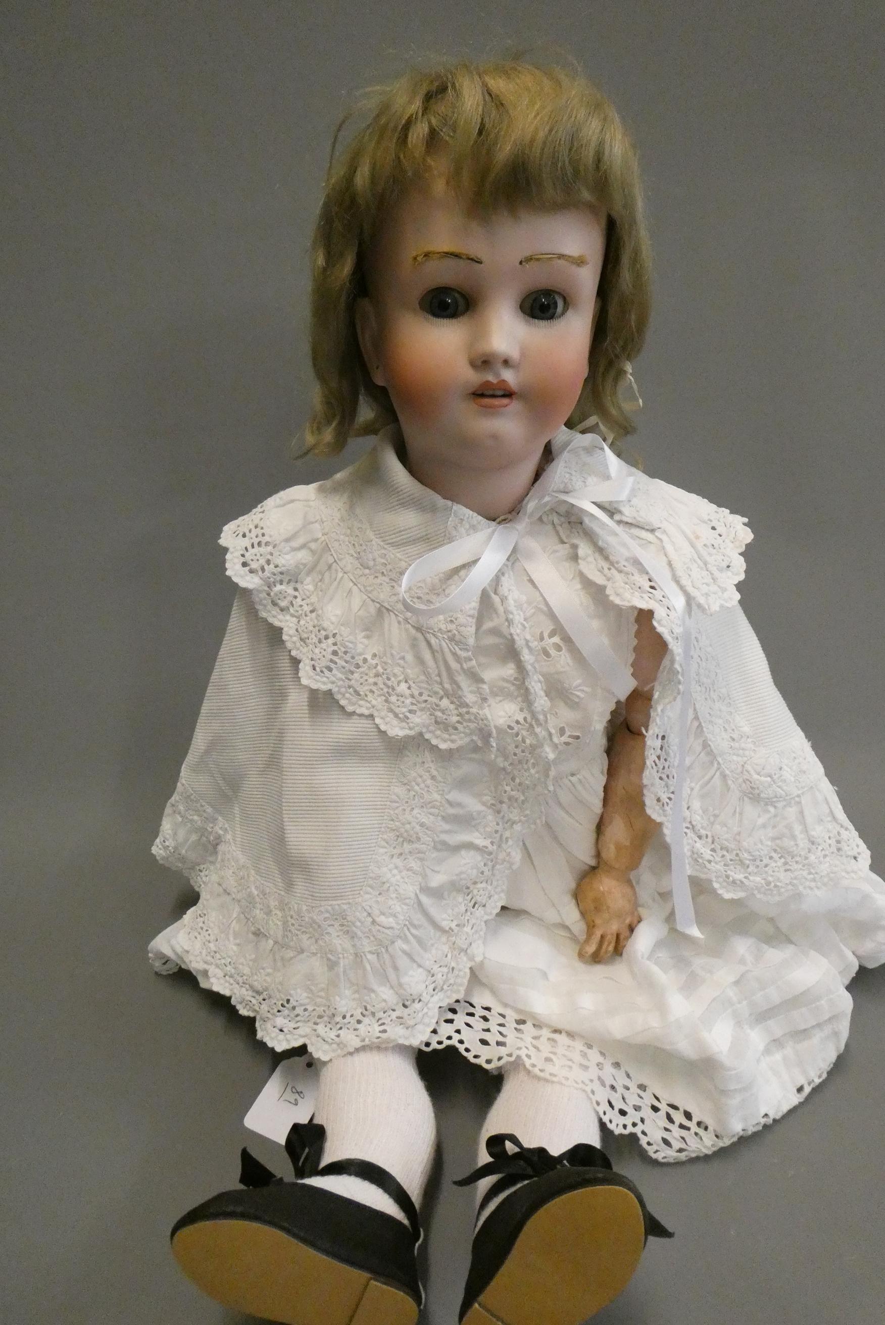 A Heinrich Handwerck Simon & Halbig bisque socket head doll Image