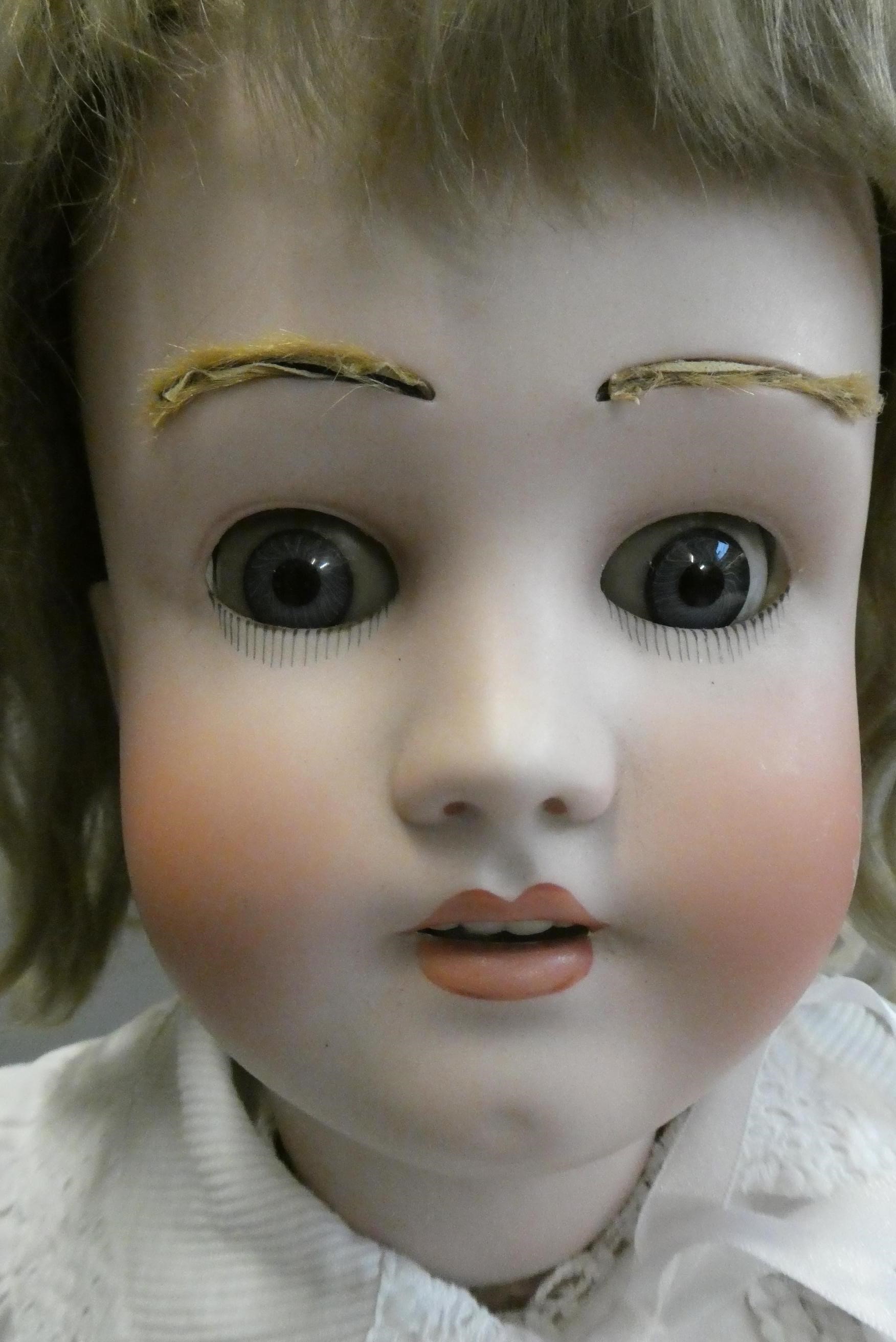 A Heinrich Handwerck Simon & Halbig bisque socket head doll Image