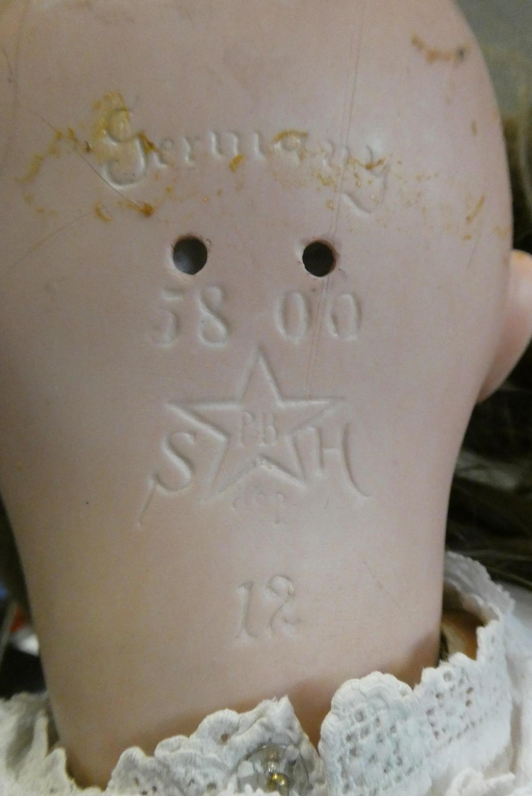 A Schoenau & Hoffmeister bisque socket head doll, with blue glass sleeping eyes, open mouth, teeth, Image