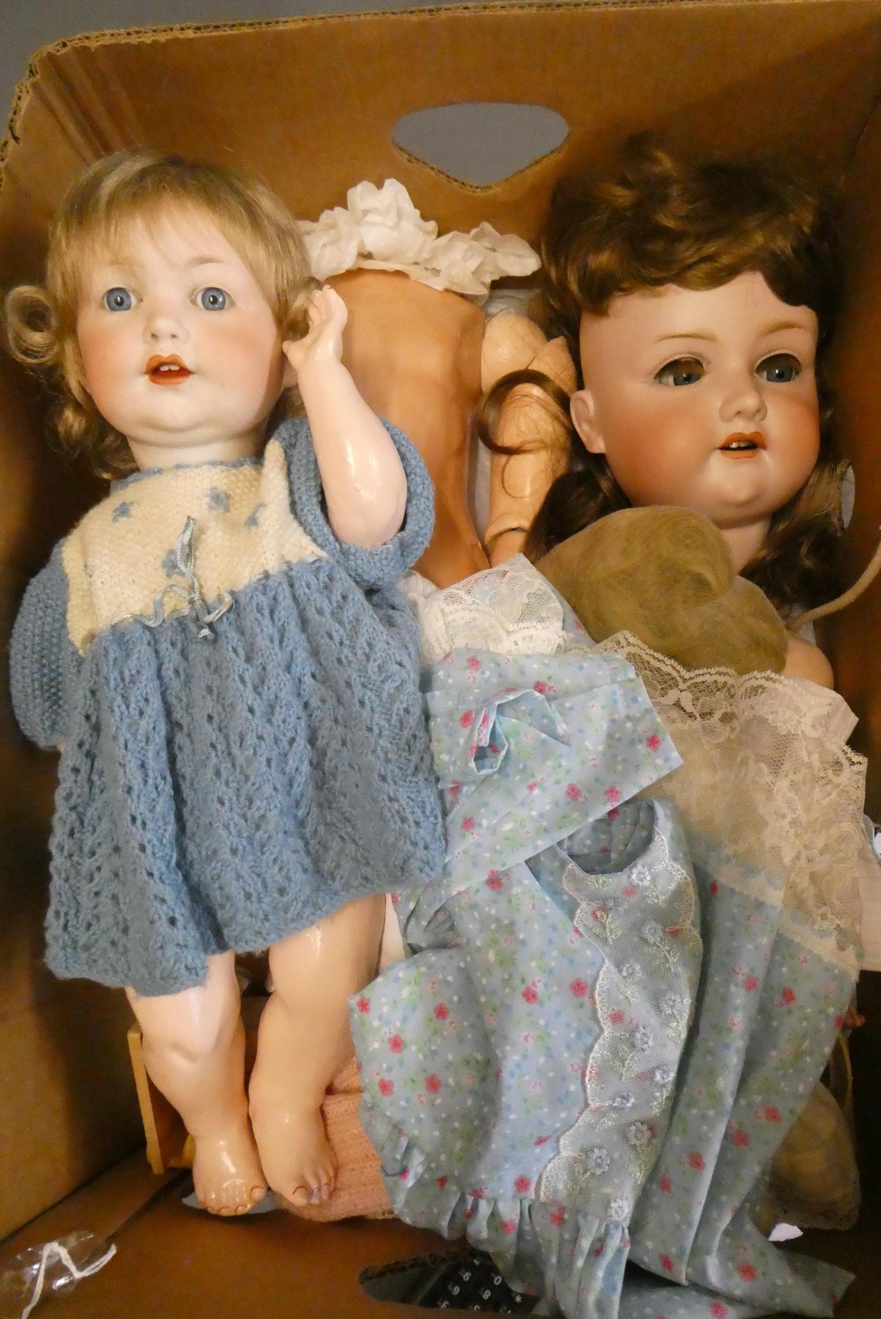 Two Armand Marseille bisque socket head dolls Image