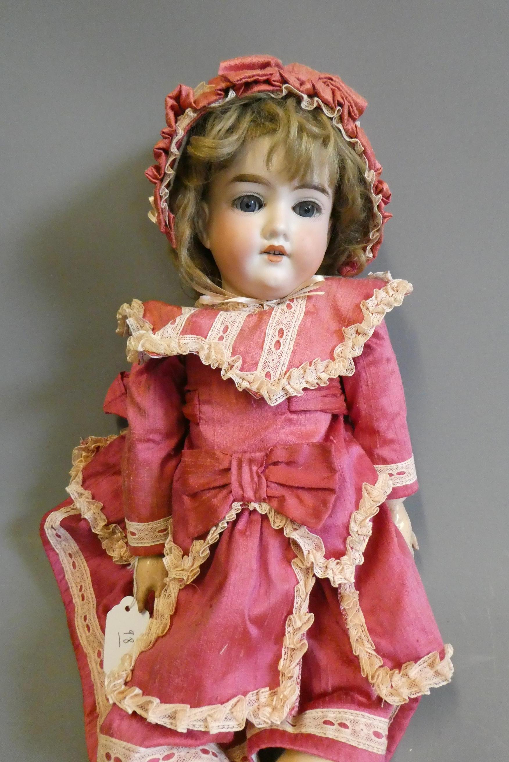 A Cuno & Otto Dressel bisque socket head doll Image