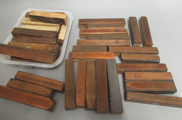 Approximately 40 Copper cigar printing blocks Image