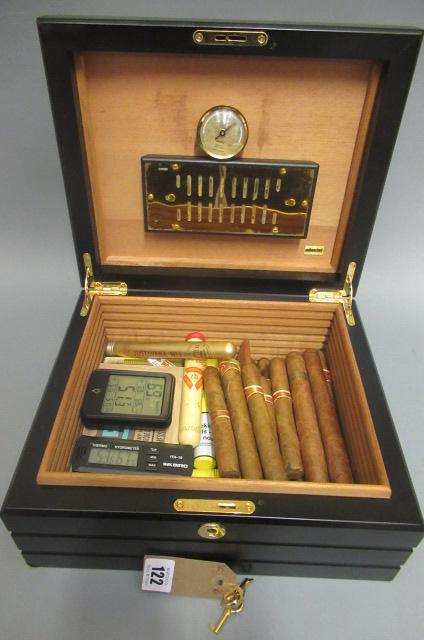 A large black adorini humidor with two keys Image