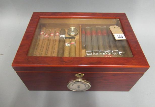 A large glass topped humidor Image
