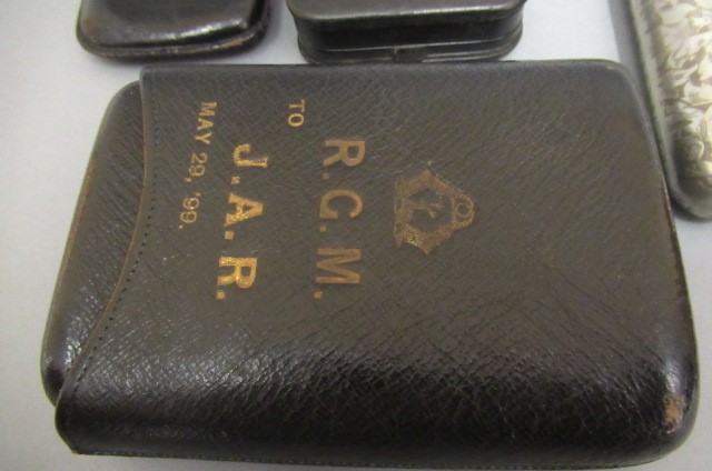 Six cigar cases Image