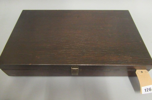 A 1950s bar top humidor containing 3 stainless steel cigar cutters Image