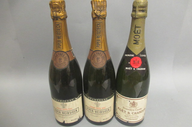 Three bottles of champagne Image