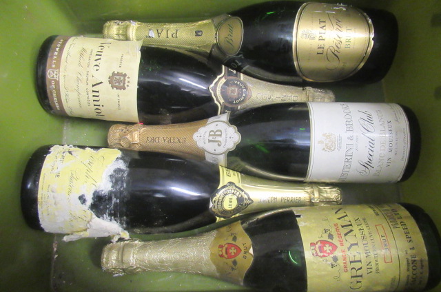 Five bottles of sparkling wine Image