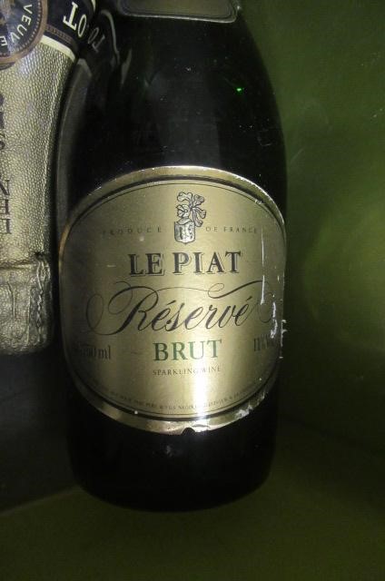 Five bottles of sparkling wine Image