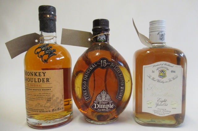 Three bottles of whisky Image