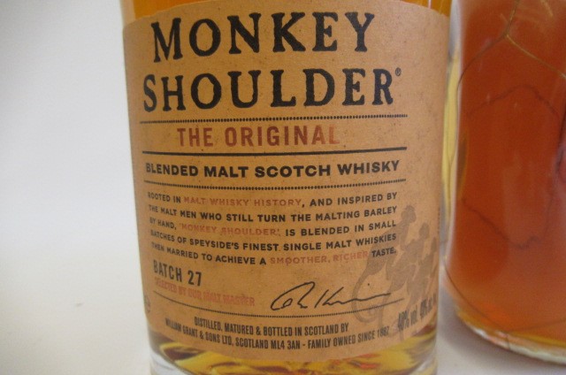 Three bottles of whisky Image