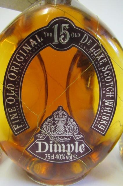 Three bottles of whisky Image