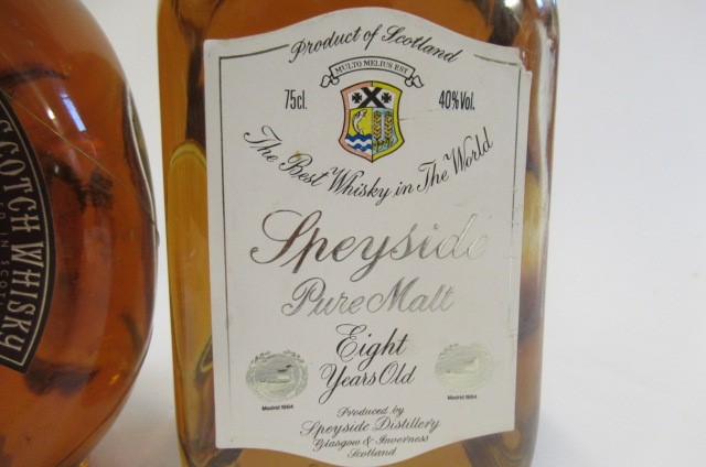 Three bottles of whisky Image