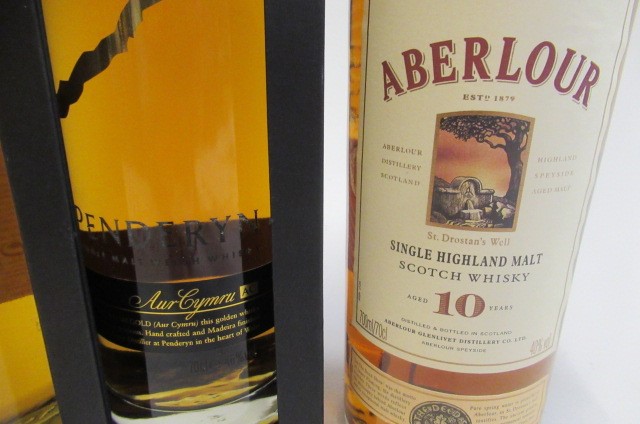 Three bottles of whisky Image