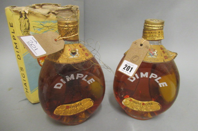 Two bottles Dimple old blended scotch whisky Image