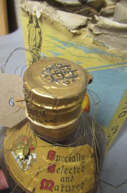 Two bottles Dimple old blended scotch whisky Image