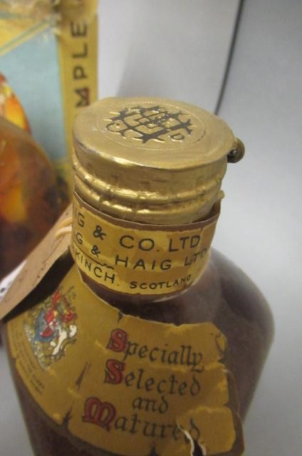 Two bottles Dimple old blended scotch whisky Image