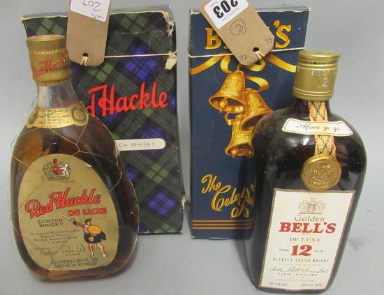 Two boxed bottles of whisky Image