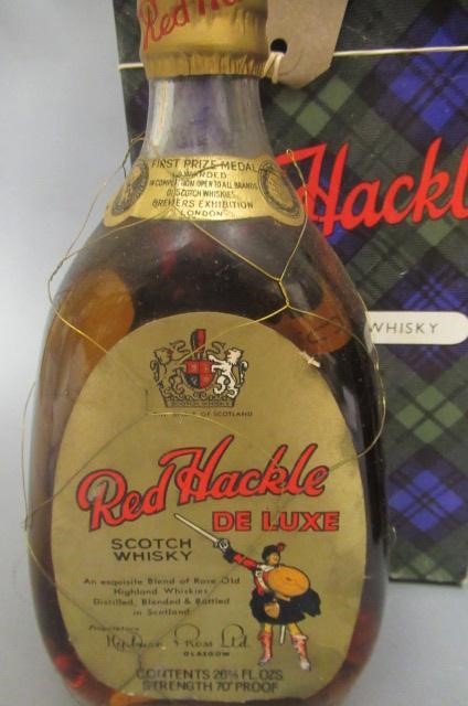 Two boxed bottles of whisky Image