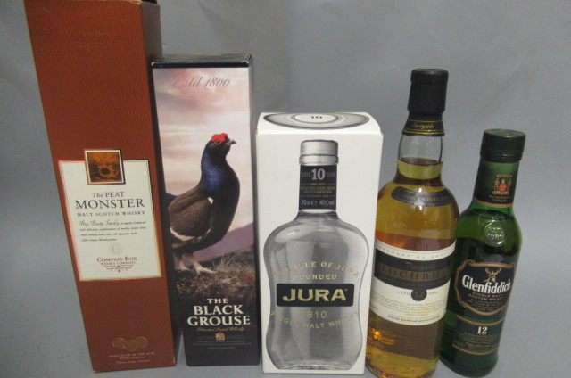 Five bottles and one half bottle scotch whisky Image