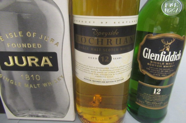 Five bottles and one half bottle scotch whisky Image