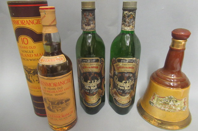 Four bottles of scotch whisky Image